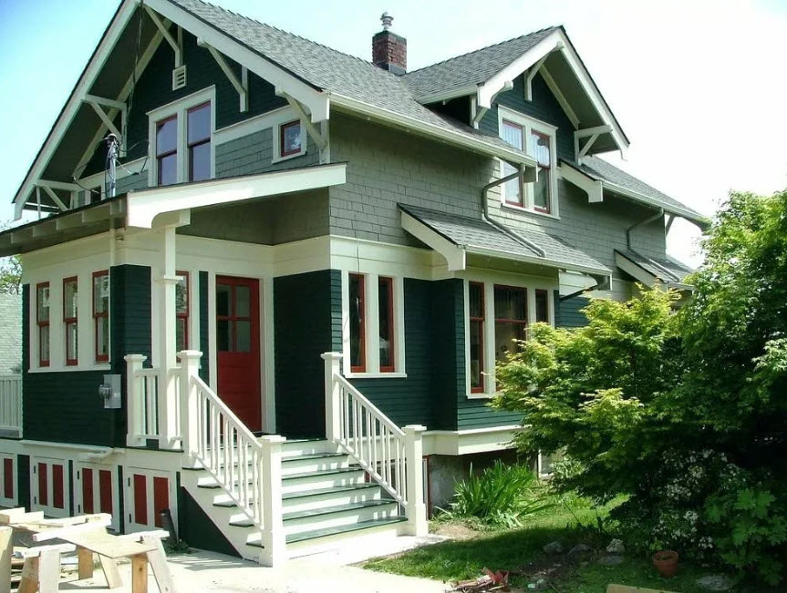 Как работает покраска деревянных домов